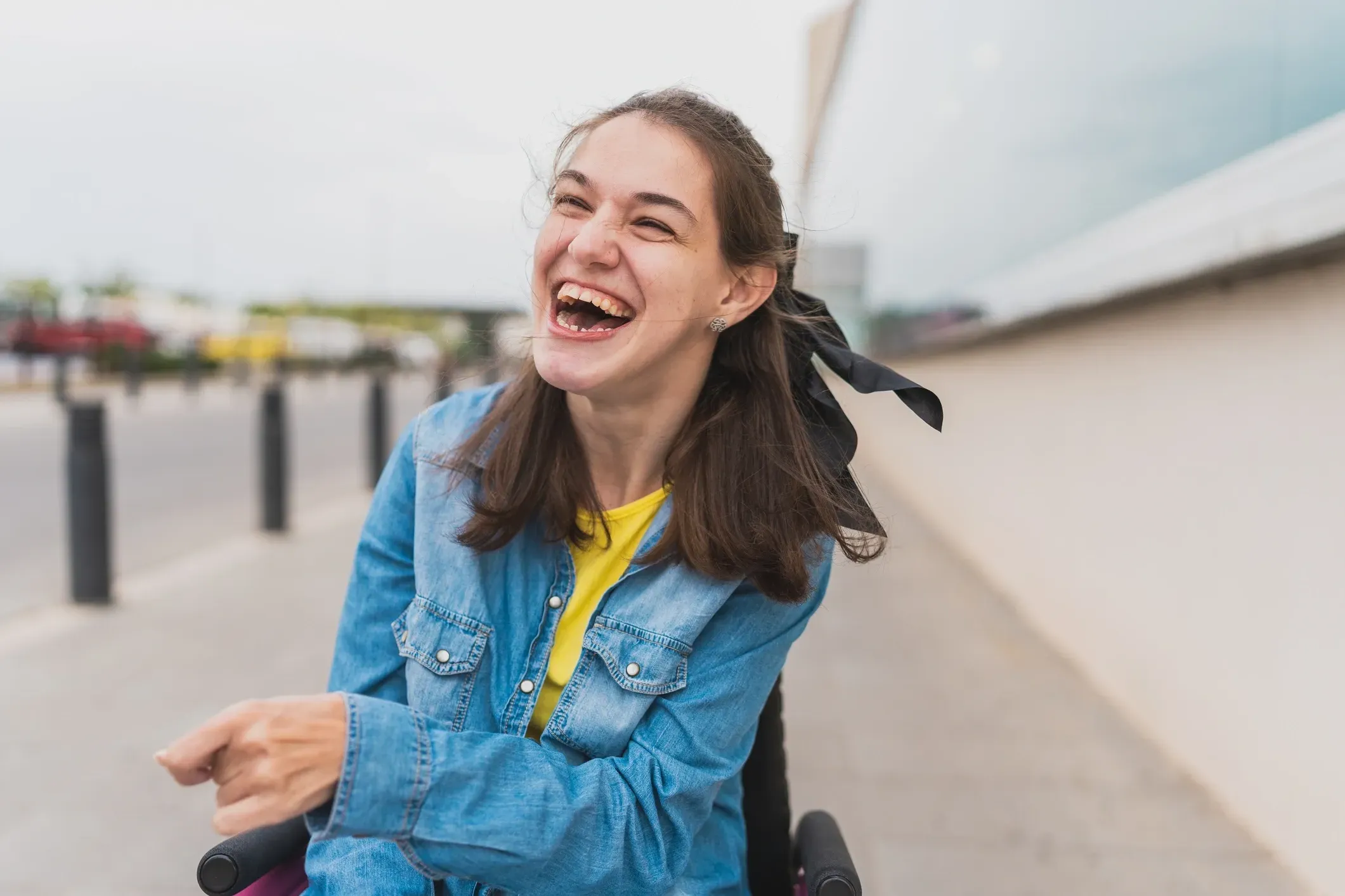 A participant smiling outdoors
